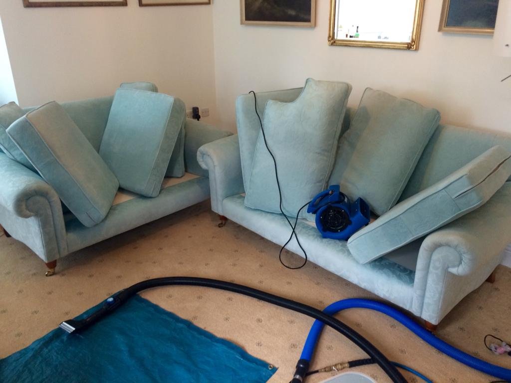 Before and after carpet cleaning result in Hastings by FabricMaster showing deep cleaned carpet